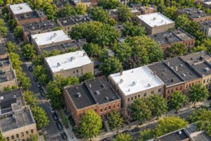 how cool roofs lower city temperatures